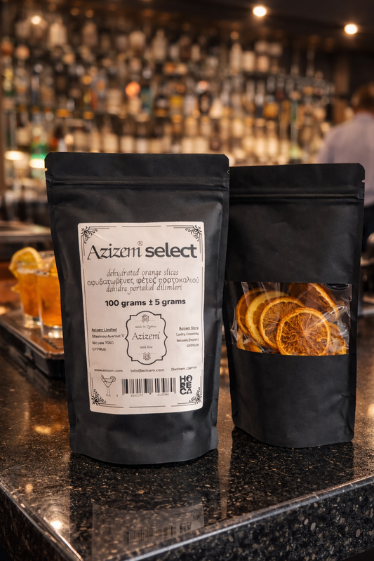 Two black bags labeled 'Azizem Select' on a bar counter with a blurred bar background.