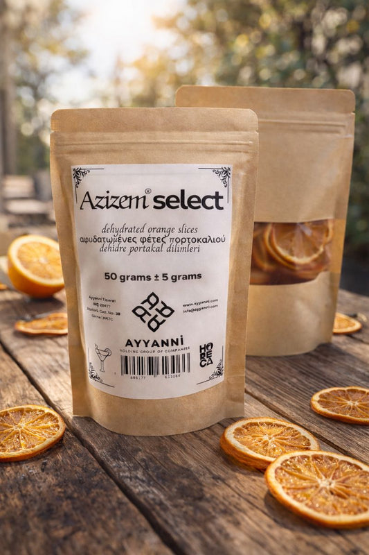 Two packages of Azizen select dried orange slices on a wooden surface with oranges in the background.
