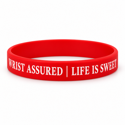 Red Wrist Assured silicone bracelet on white background