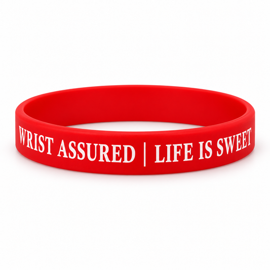 Red Wrist Assured silicone bracelet on white background
